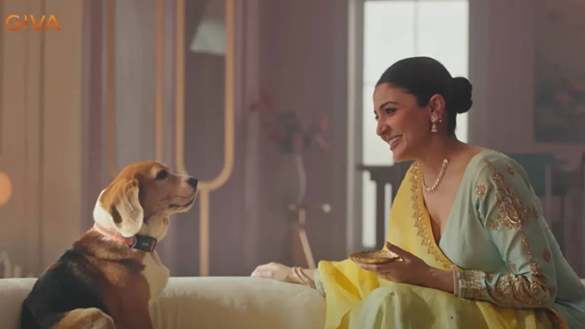 Anushka Sharma tying a rakhi on a pet dog in GIVA's 2025 Ties of Love campaign