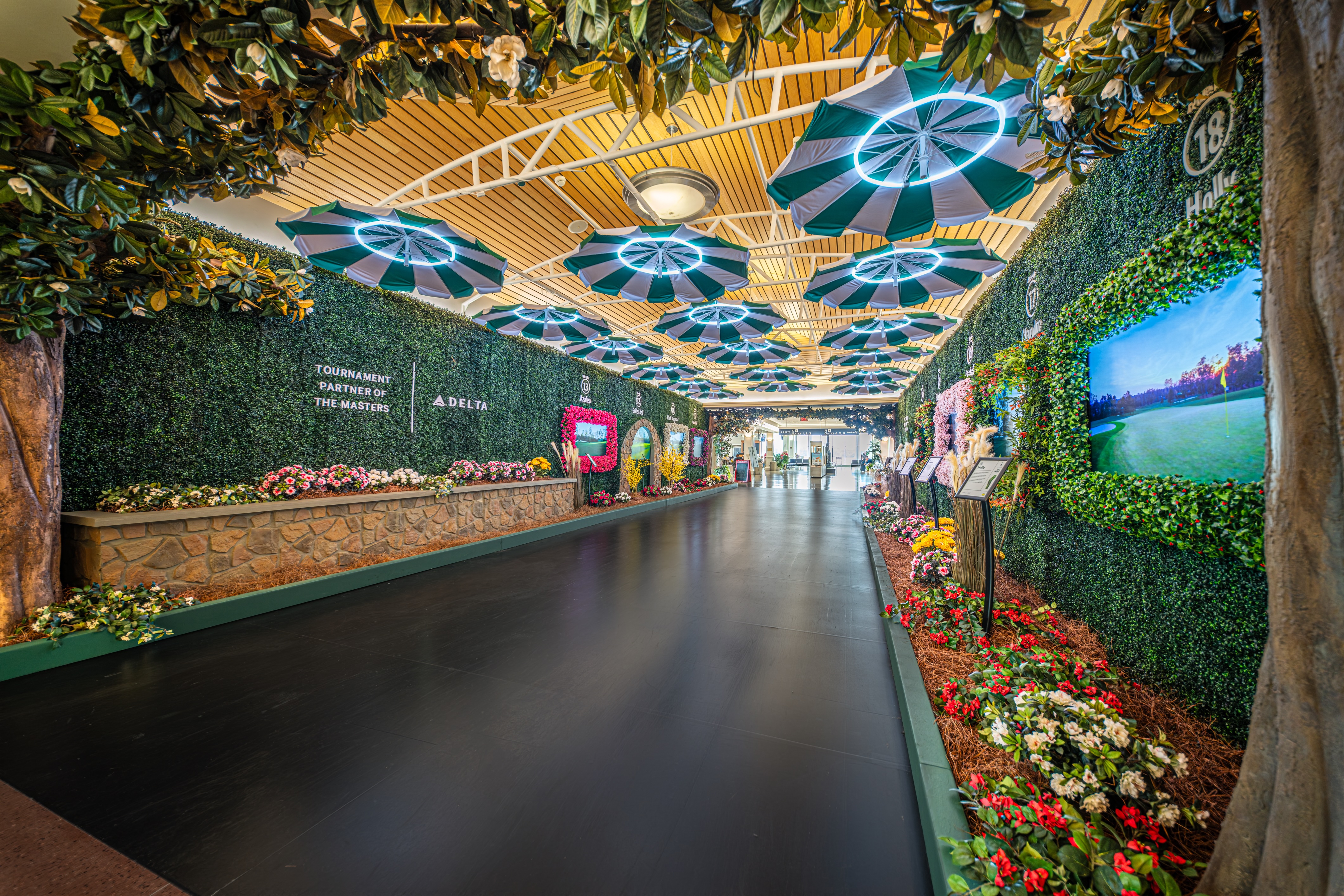 Delta immersive Augusta National back-nine walkthrough installation at Augusta Regional Airport during Masters Tournament week