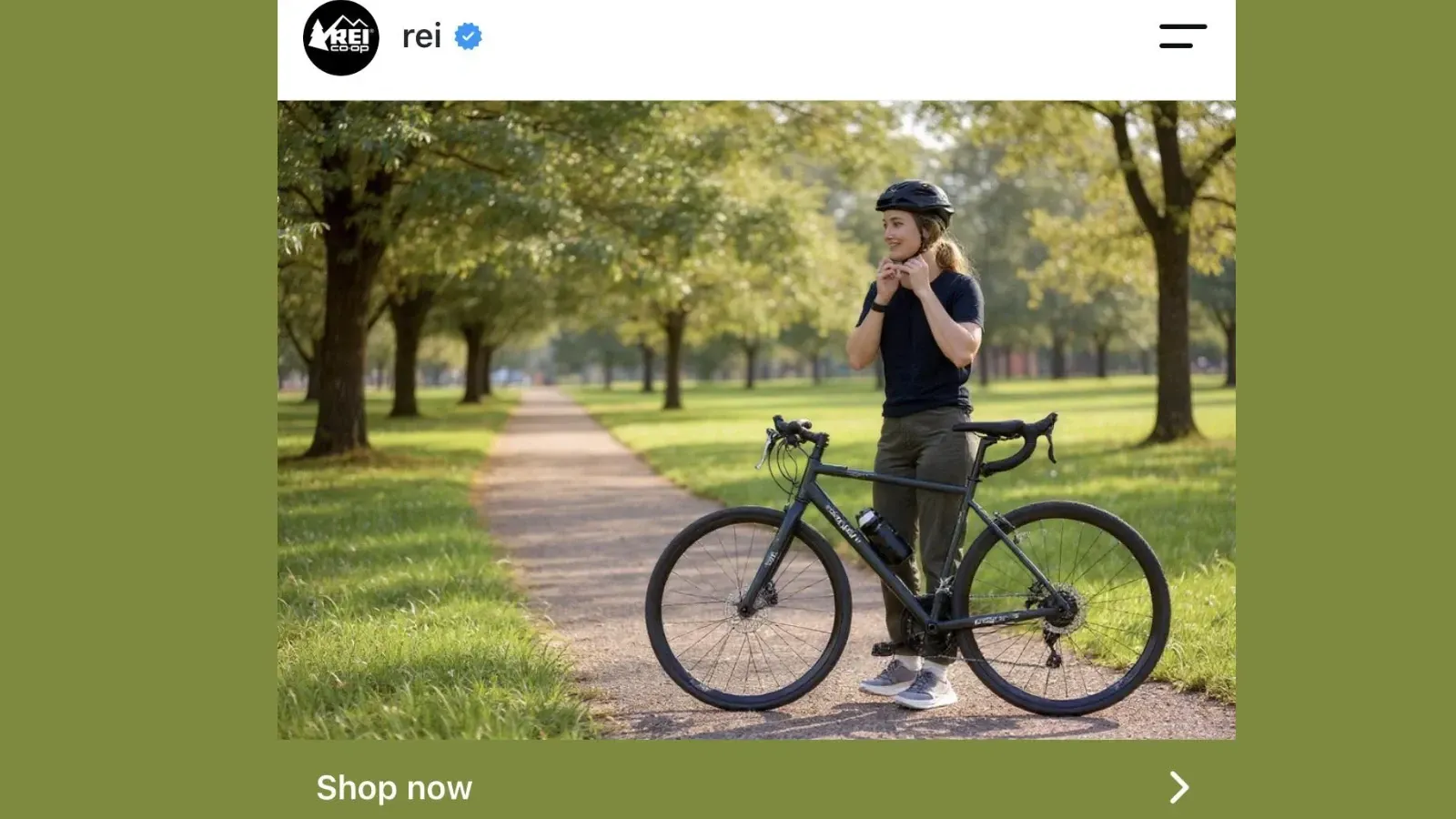 REI bicycle ad screenshot showing a bike altered with two sets of handlebars